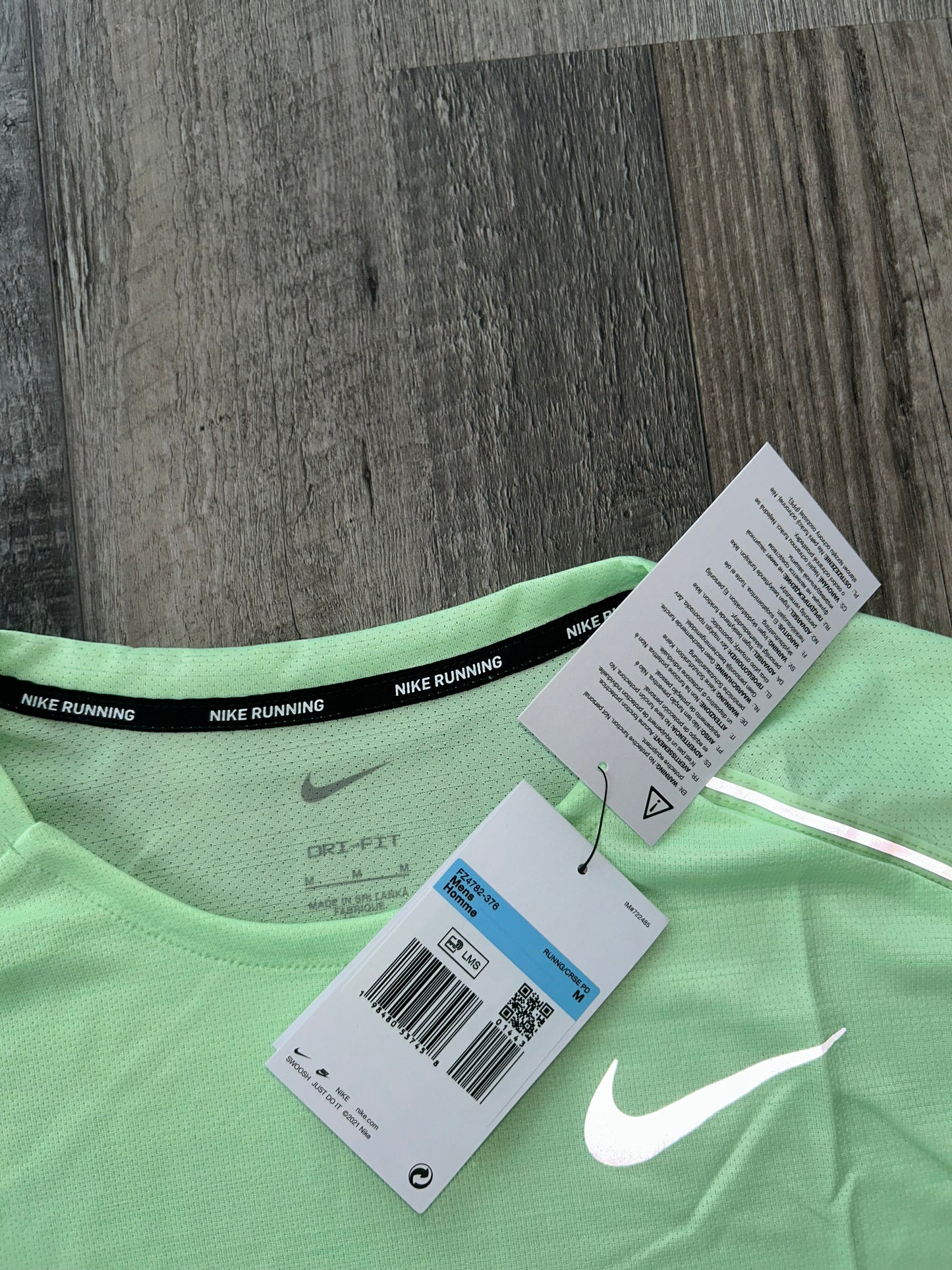 Nike miler set Vapour green with Grey challenger shorts