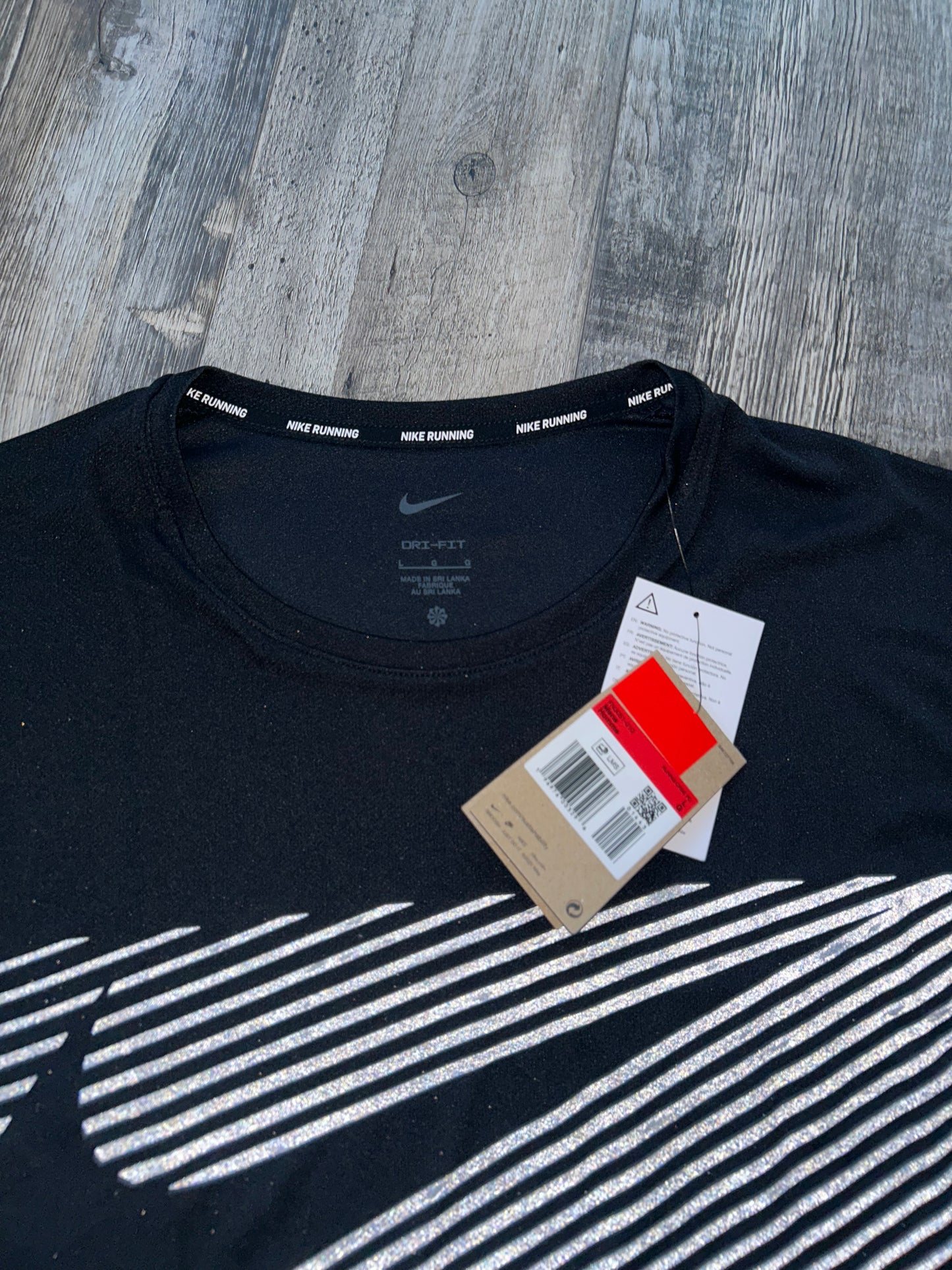 Nike miler flash division “Black”