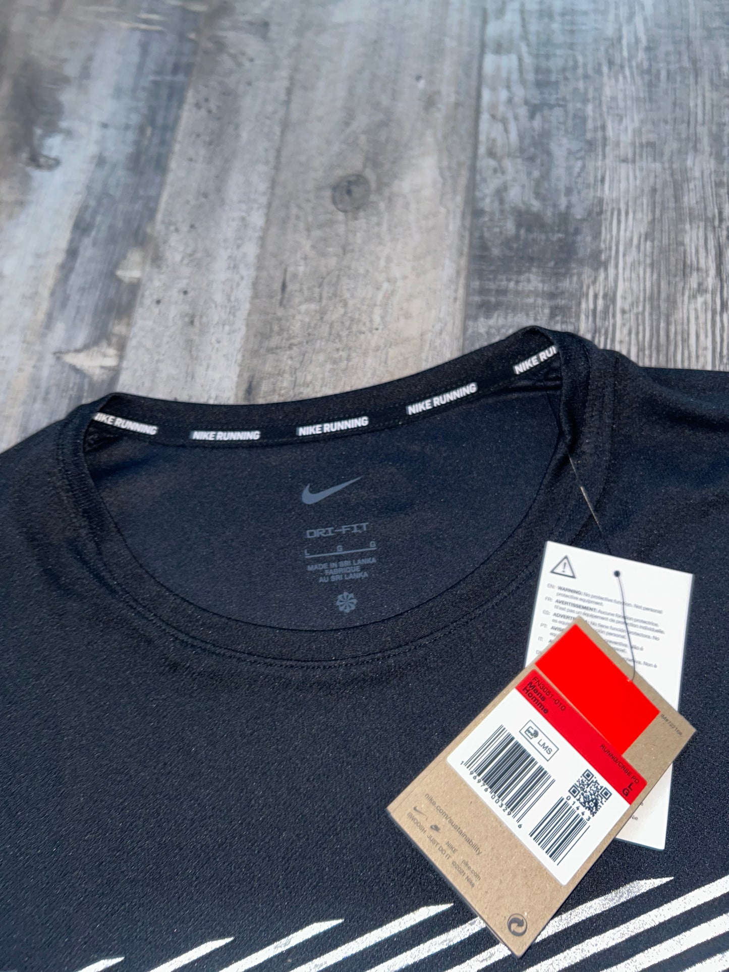 Nike miler flash division “Black”